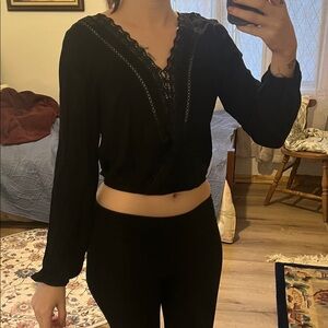 Black cinch waist lace deep V top
